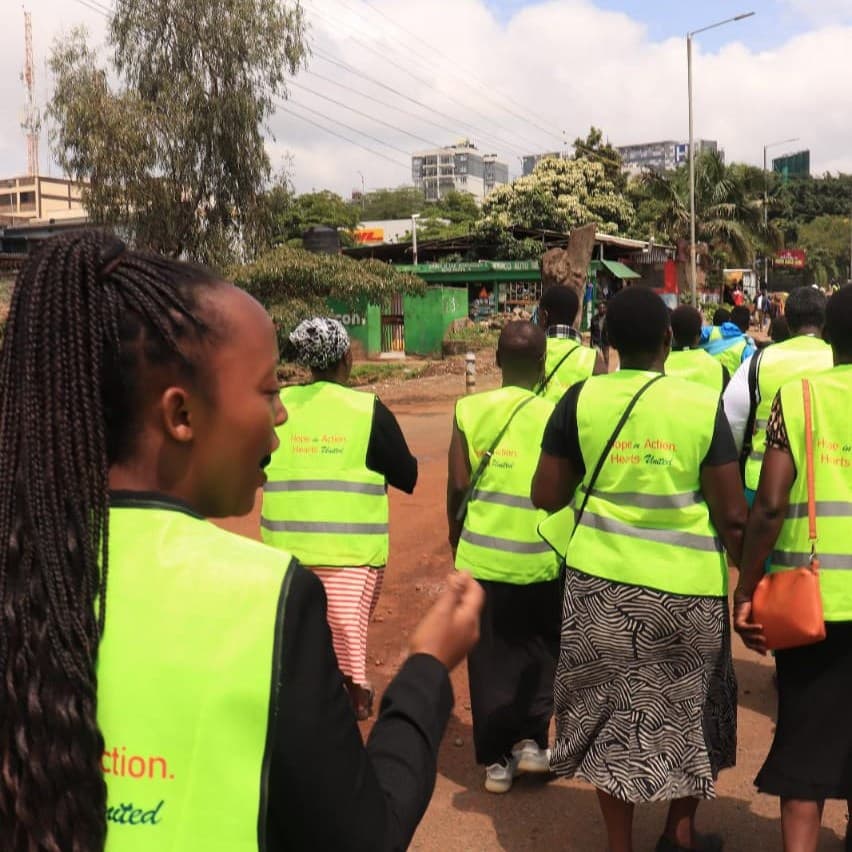 Volunteers distributing relief supplies in a Nairobi settlement