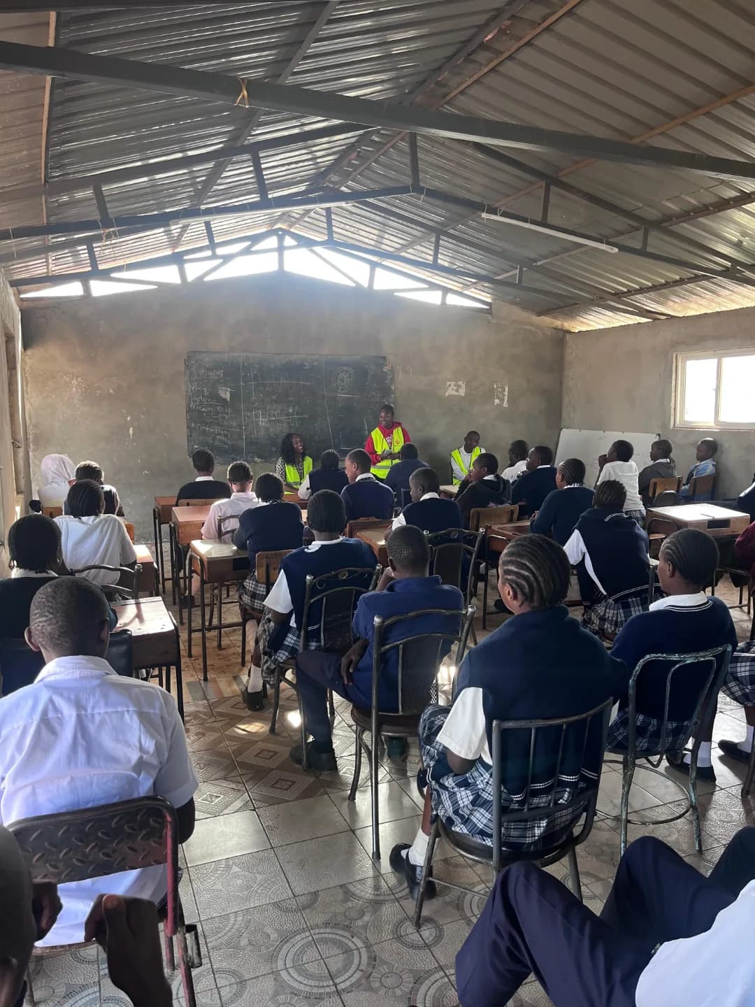 A student listening during a mentorship session