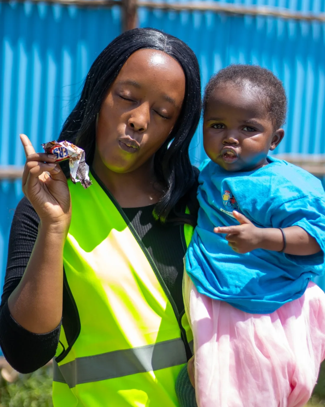 Mercy of Hope's founder holding a child from a supported community